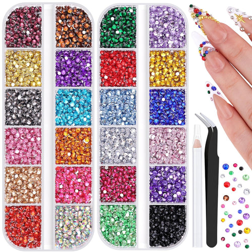 Assorted multicolor flatback resin rhinestones in divided containers with tweezers and pick-up pencil, plus decorated fingernails.