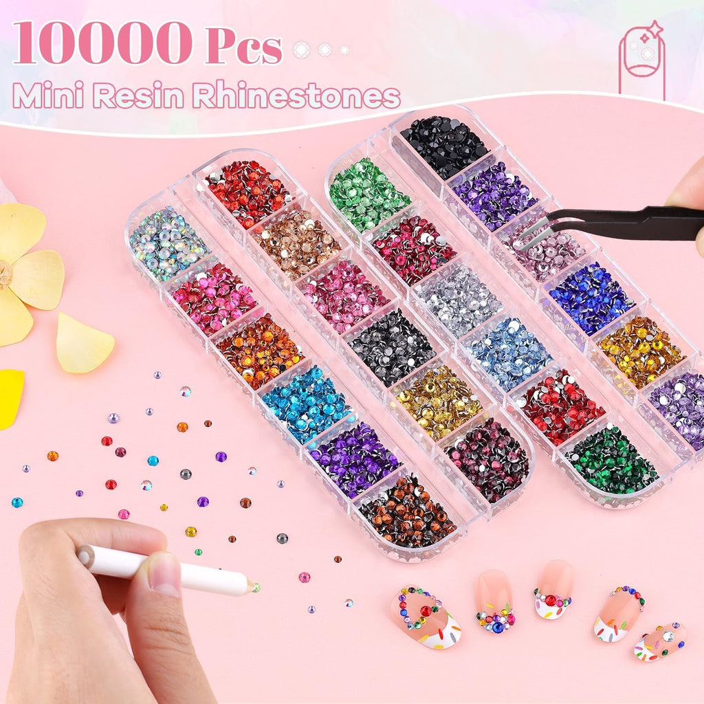 Nail art kit with multicolor resin rhinestones in divided case, tweezers, and pick-up pencil