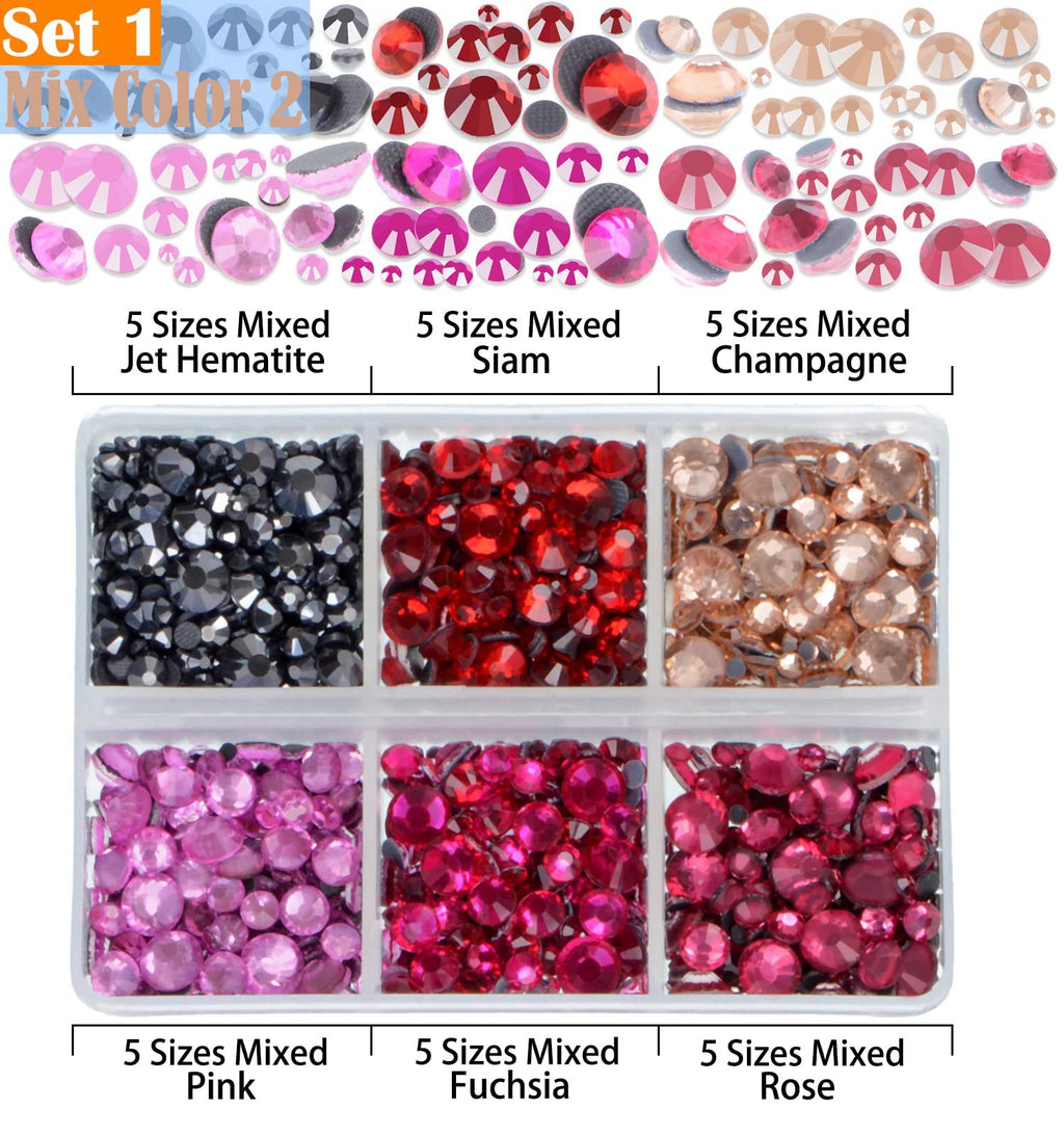 Assortment of mixed color and size hotfix rhinestones in a divided container, labeled by color.