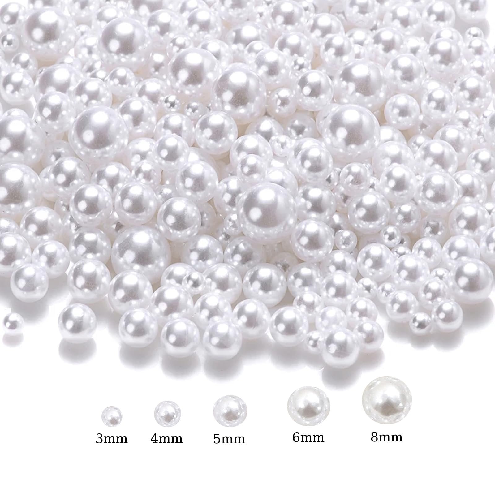 Assortment of white no-hole ABS plastic craft pearls in mixed sizes from 3mm to 8mm, shown on a white background with size labels.