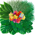Assortment of artificial tropical leaves and hibiscus flowers in various colors on a white background.