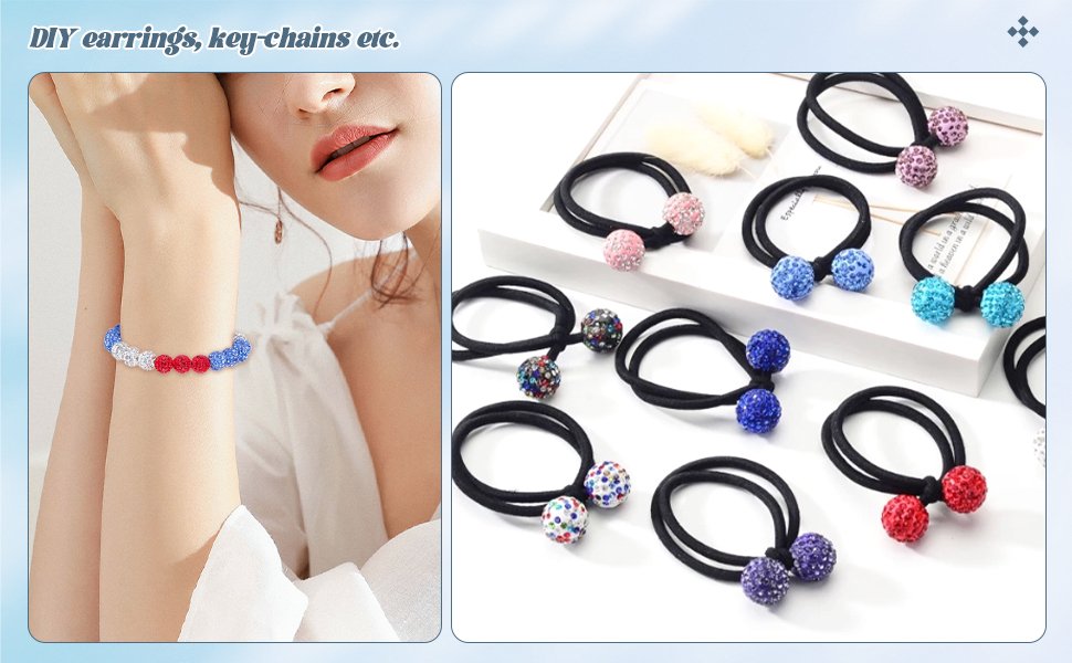 Woman wearing a red, white, and blue rhinestone bracelet; multiple colorful rhinestone ball hair ties on a white surface.
