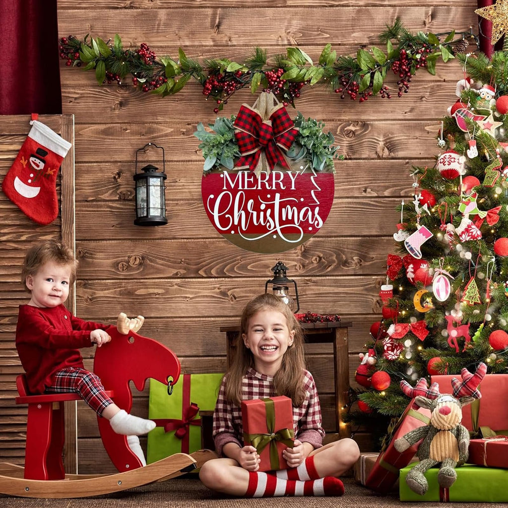 Christmas scene with a wooden 'Merry Christmas' sign, children, gifts, and a decorated tree