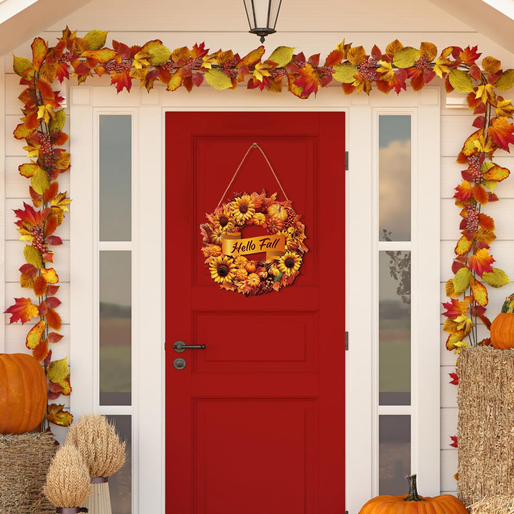Front door decorated for fall with a sunflower and pumpkin wreath and autumn leaf garland.