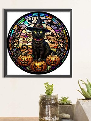 Diamond painting kit featuring a black cat in a witch hat with pumpkins, designed to look like stained glass.