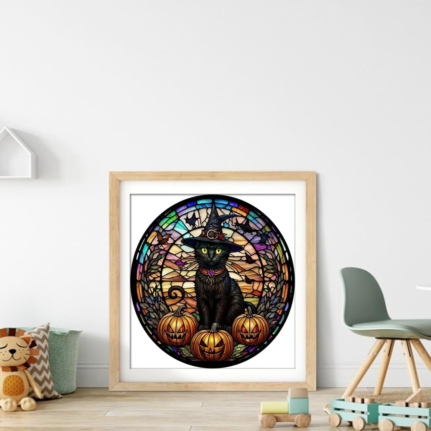 Diamond painting kit featuring a black cat in a witch hat with pumpkins, set against a stained glass background.
