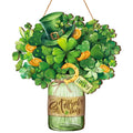 St. Patrick's Day wooden welcome sign shaped like a mason jar filled with shamrocks, a leprechaun hat, and a horseshoe.