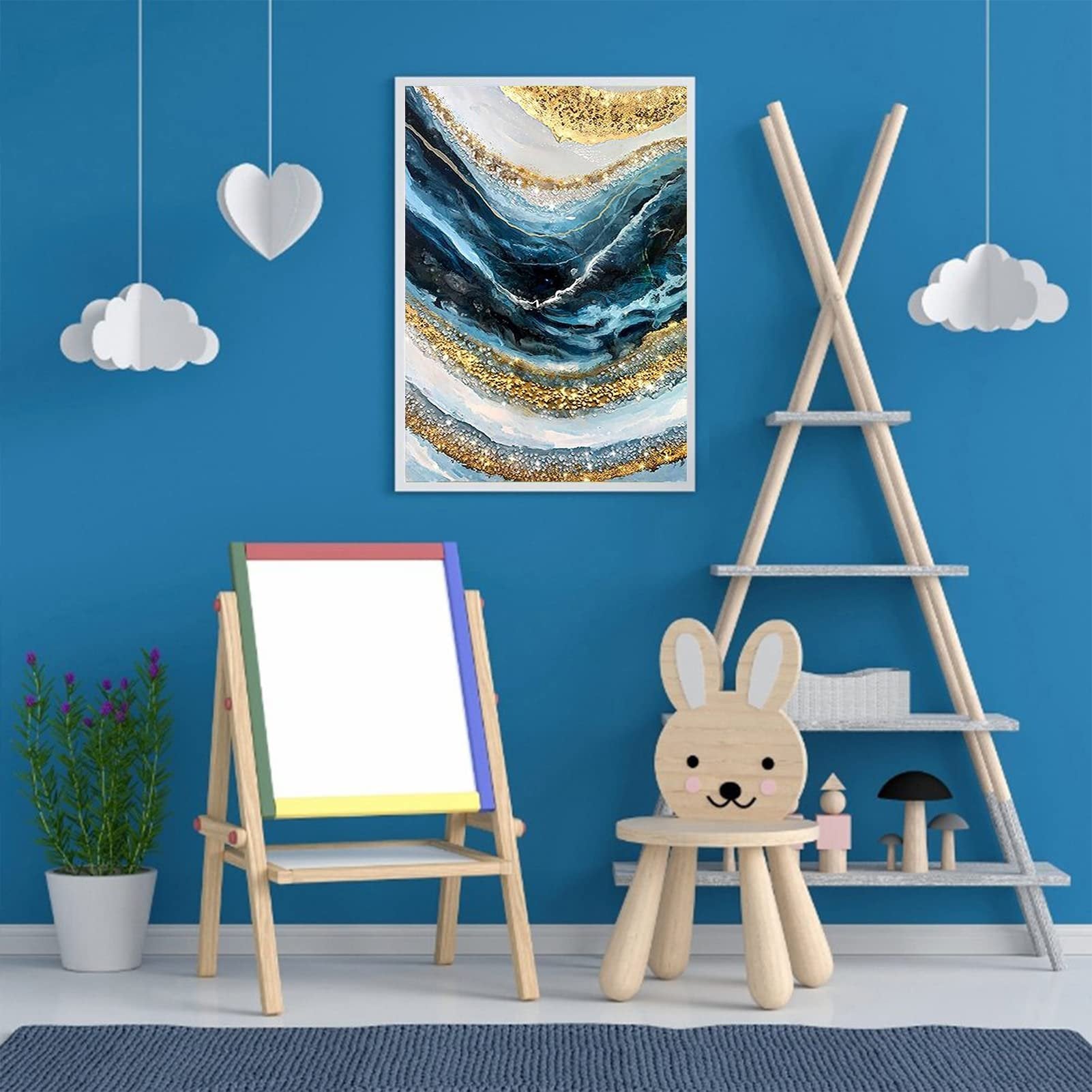 Abstract wave diamond painting artwork in a white frame hanging on a blue wall in a child's room setting.