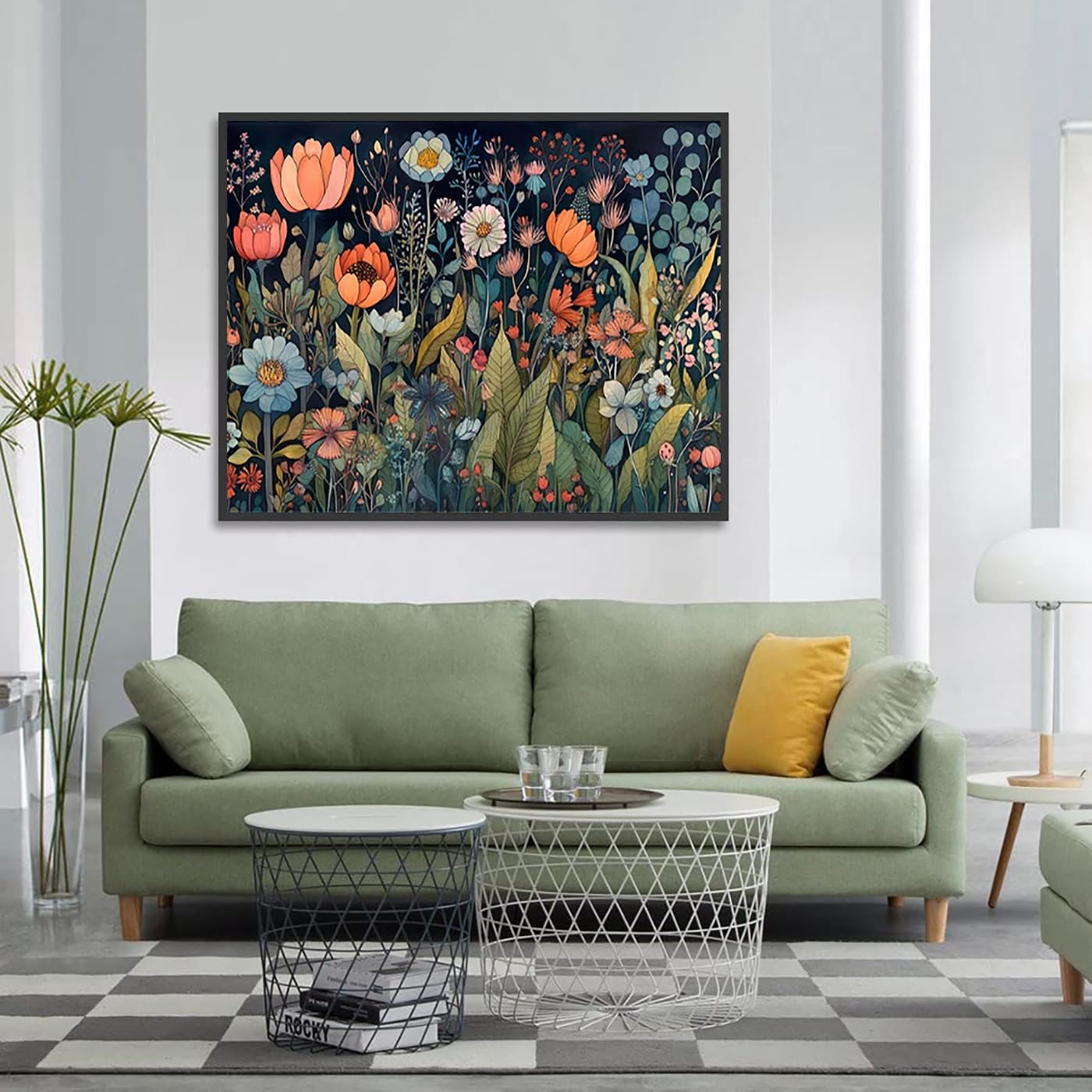 Framed floral diamond painting art displayed above a green sofa in a living room setting.