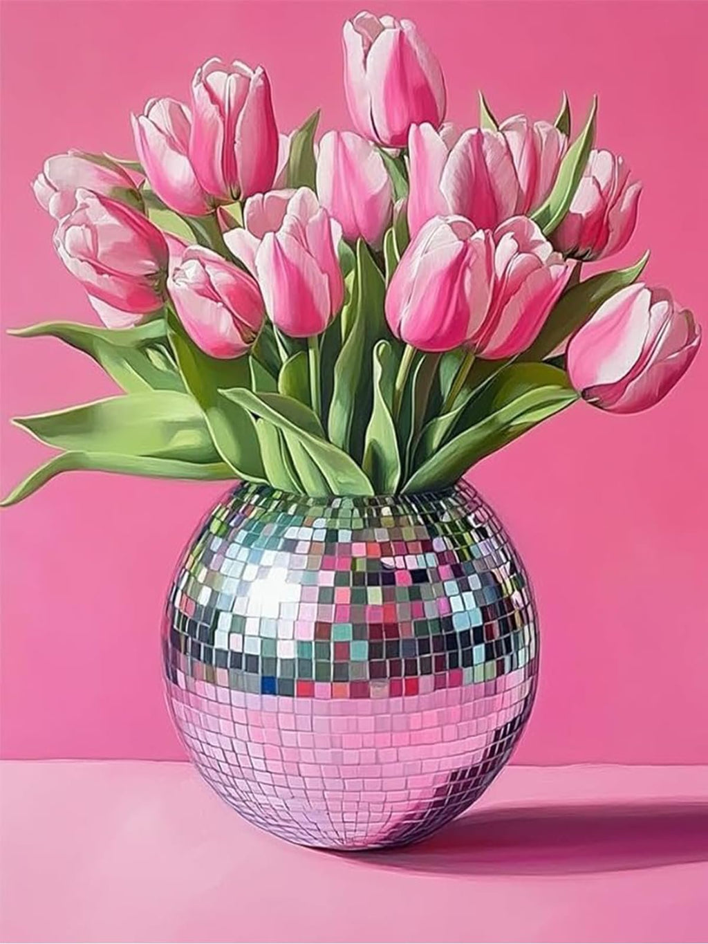 Pink tulips in a disco ball vase against a pink background