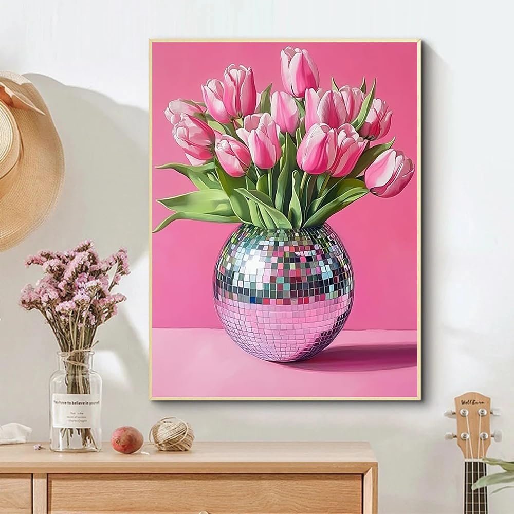 Pink tulips in a disco ball vase on a pink surface, part of a diamond painting kit.