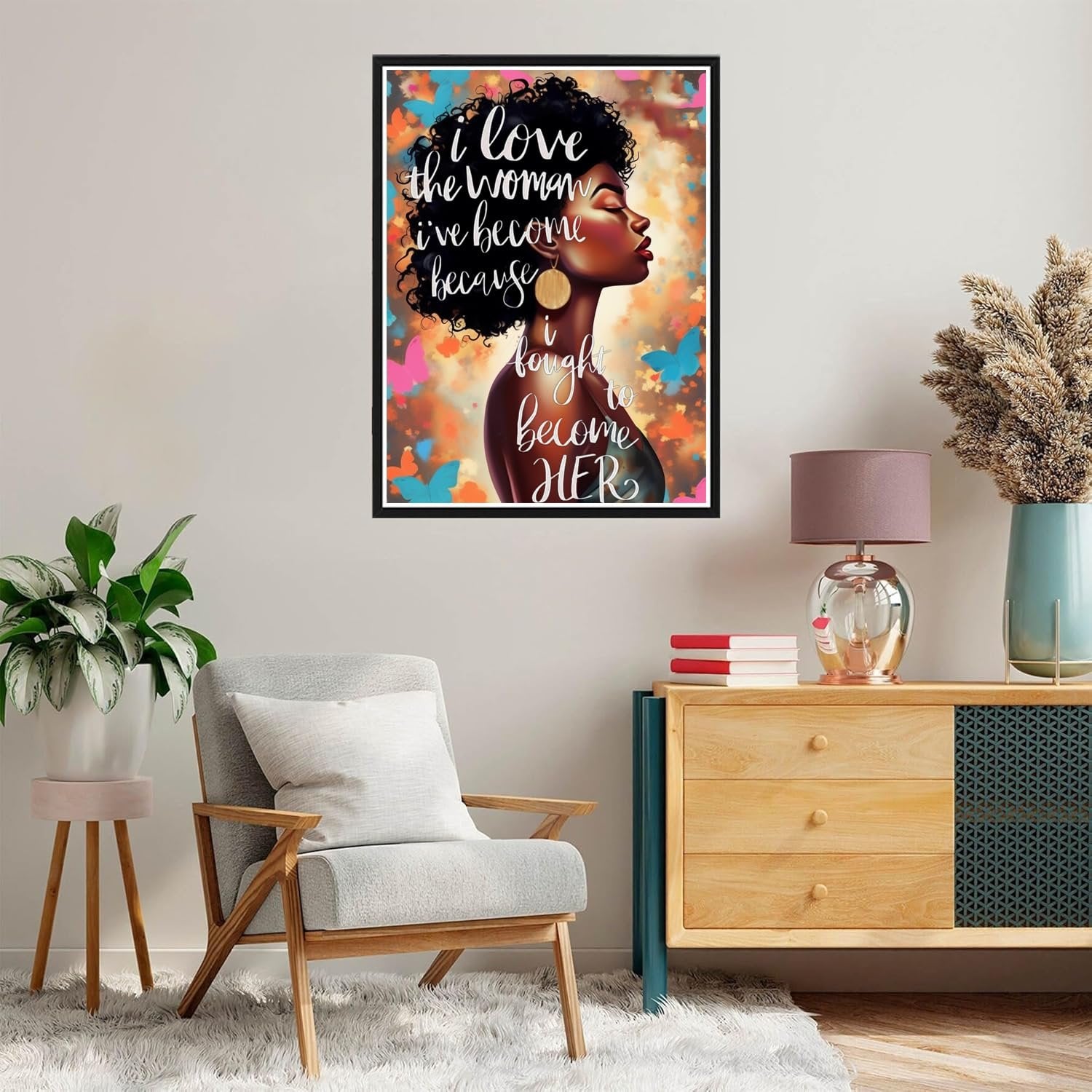 Diamond painting kit featuring an abstract black woman with text overlay, displayed in a modern living room setting.