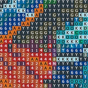 Diamond painting canvas with color-coded squares and symbols, close-up view.