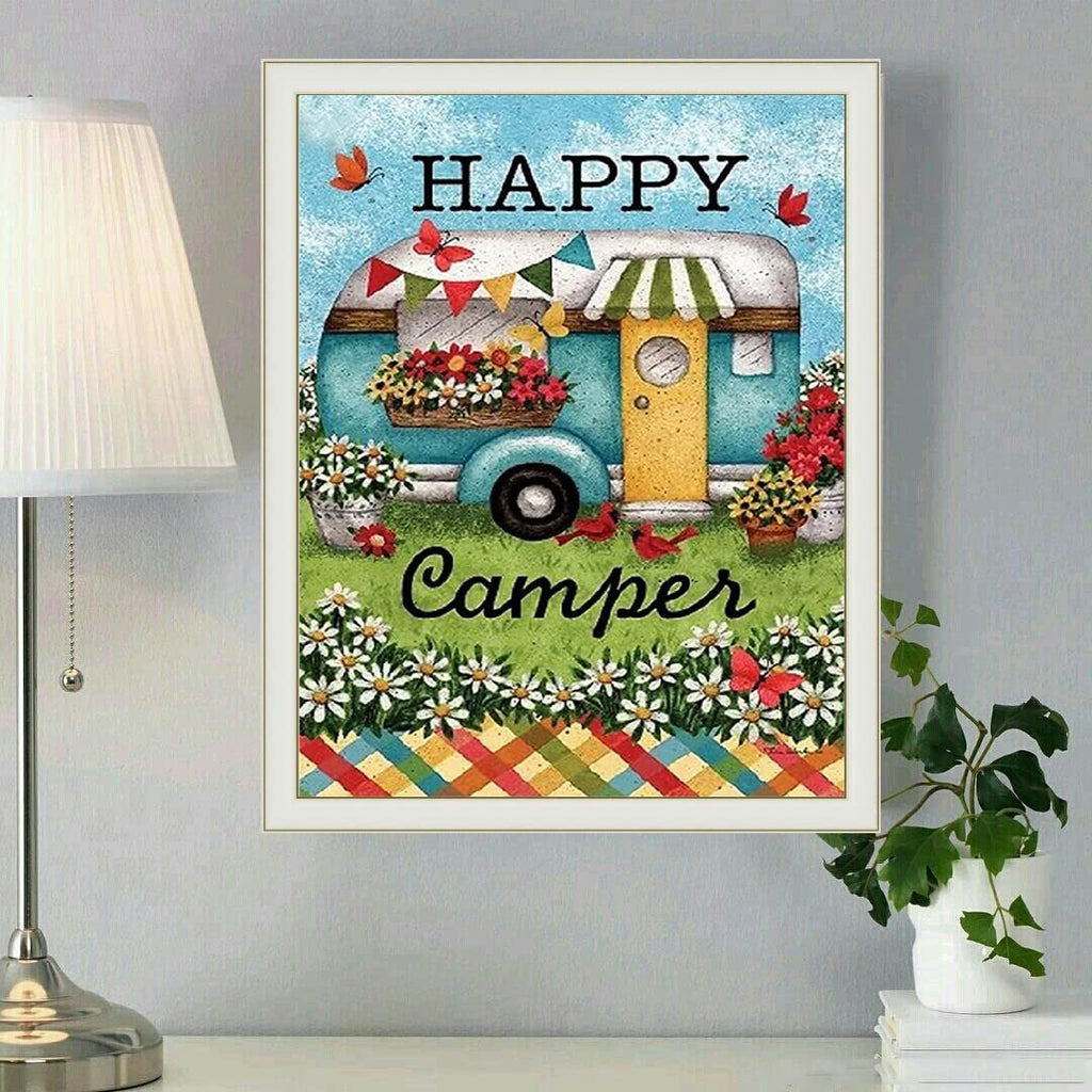 Diamond painting kit featuring a blue camper with flowers and butterflies, text reads HAPPY Camper.