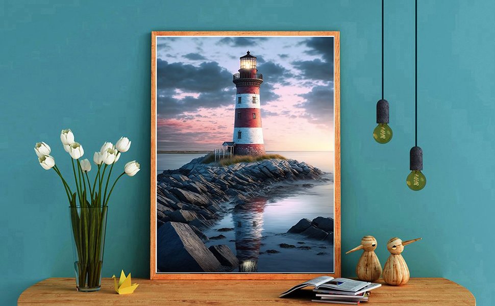 Diamond painting kit featuring a lighthouse on a rocky island at sunset, framed and displayed on a wall.