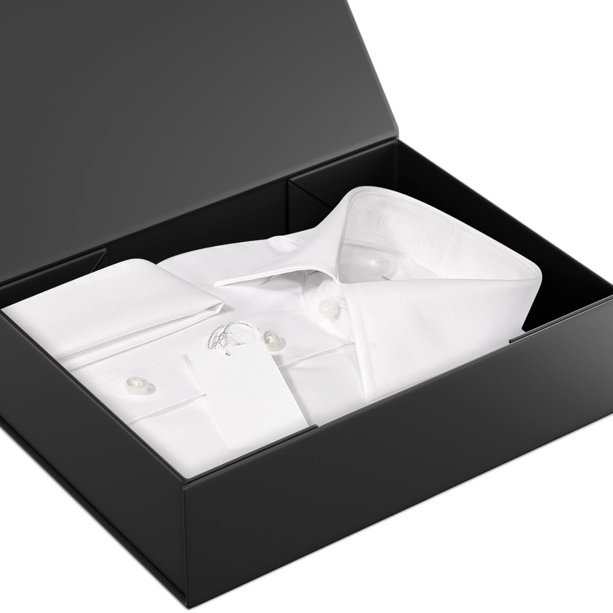 White dress shirt neatly folded inside an open black gift box with a magnetic closure lid.