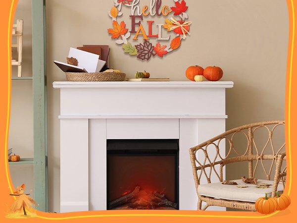 Wooden fall leaves welcome sign with pumpkins and a chair near a fireplace.