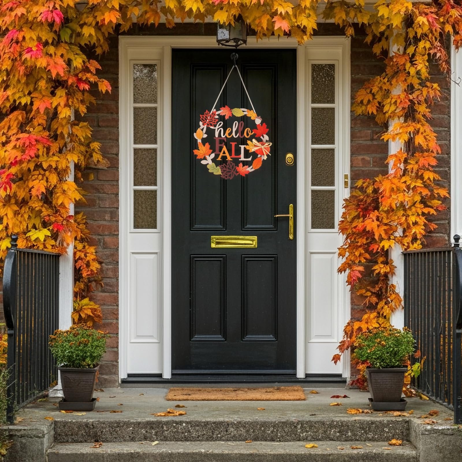 Front door decorated with a fall wreath that says 'hello FALL' surrounded by autumn leaves.