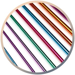 Close-up of multicolor aluminum Tunisian crochet hooks arranged diagonally on a white background.