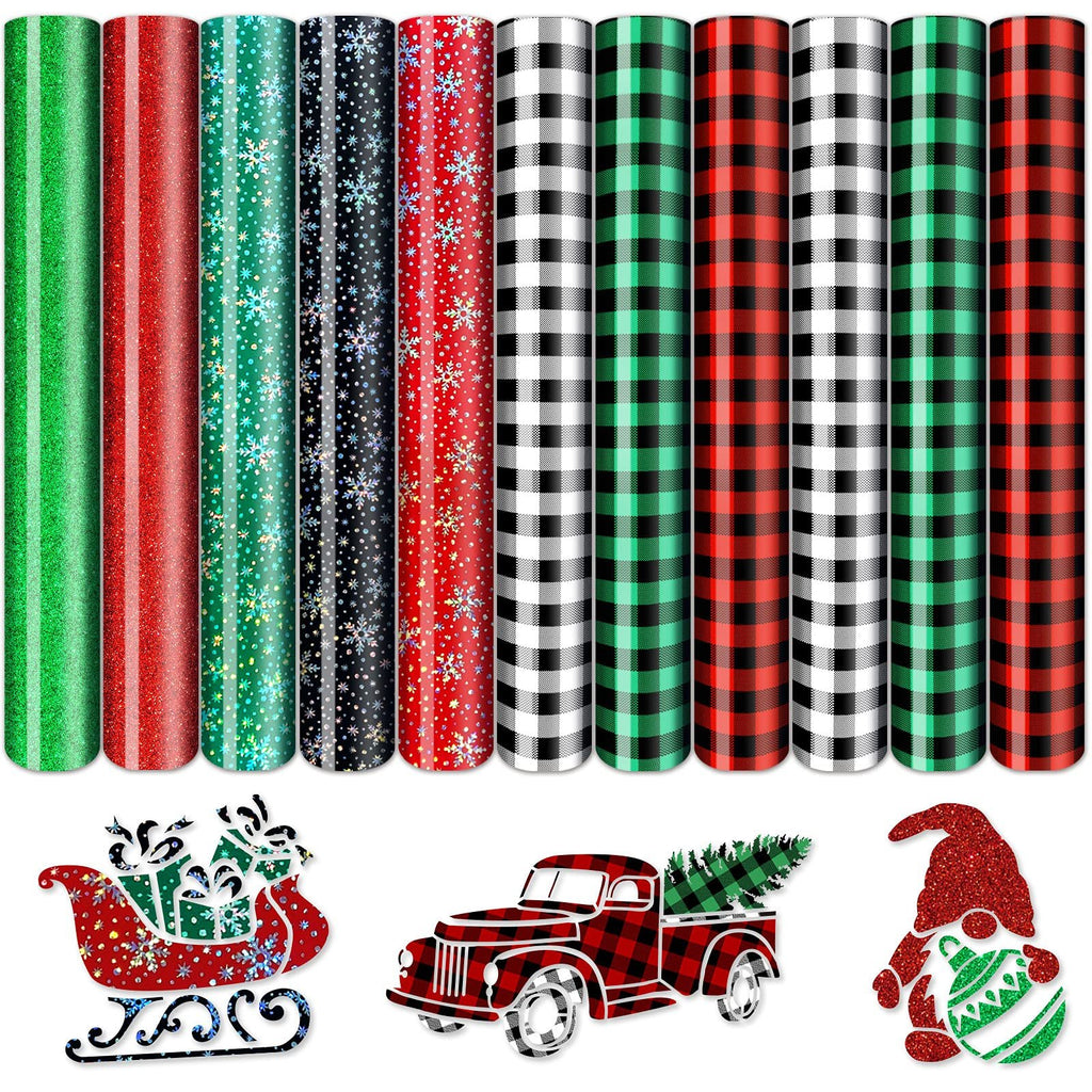 Collection of 11 rolls of Christmas-themed heat transfer vinyl with glitter, snowflakes, and buffalo plaid patterns, plus a sleigh, truck, and gnome graphic.