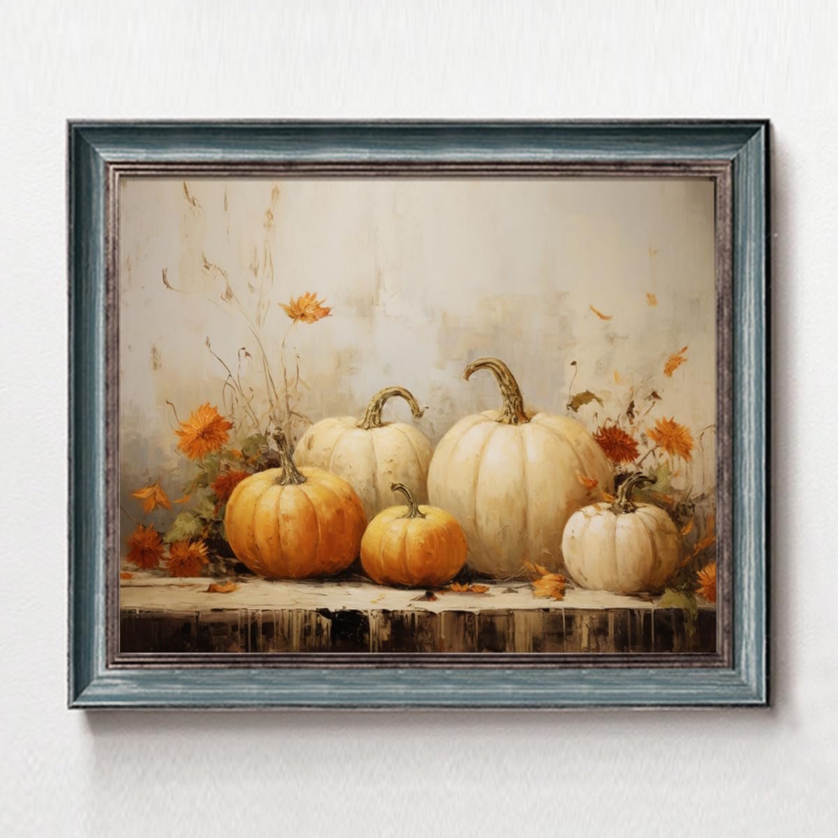 Still life art print of white and orange pumpkins with fall foliage in a rustic frame.