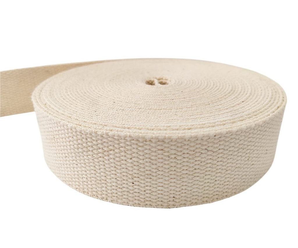 Roll of natural cotton webbing, 1.5 inches wide, shown from the side on a white background.
