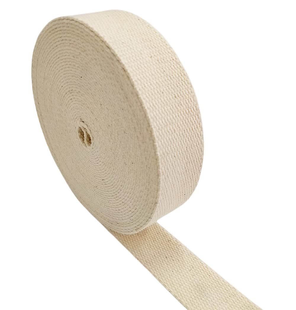Roll of natural cotton webbing with a loose end, shown from an angled perspective on a white background.