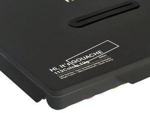 Black carrying case for gouache paint set, showing text 'Hi, It's GOUACHE 112Colors 12g'