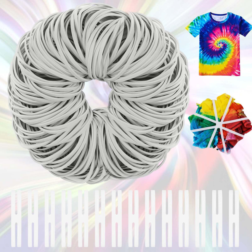 Large bundle of white rubber bands with a tie-dyed t-shirt and fabric swatch in the background