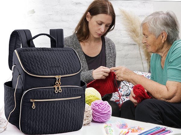 Black quilted knitting backpack with yarn and knitting supplies, two women knitting in background