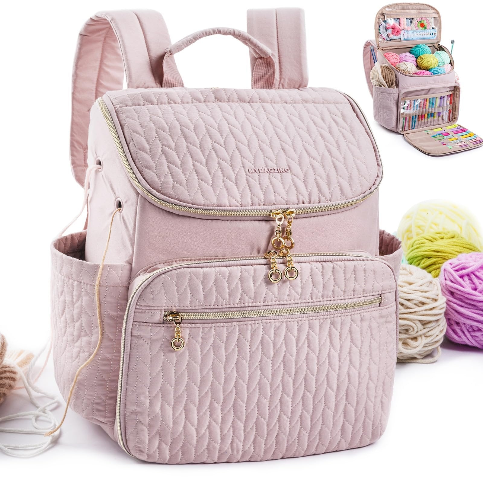 Pink quilted knitting backpack with yarn balls and an open organizer insert showing craft supplies