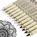 Set of black micro fineliner drawing pens with various tip sizes, shown with a mandala design.