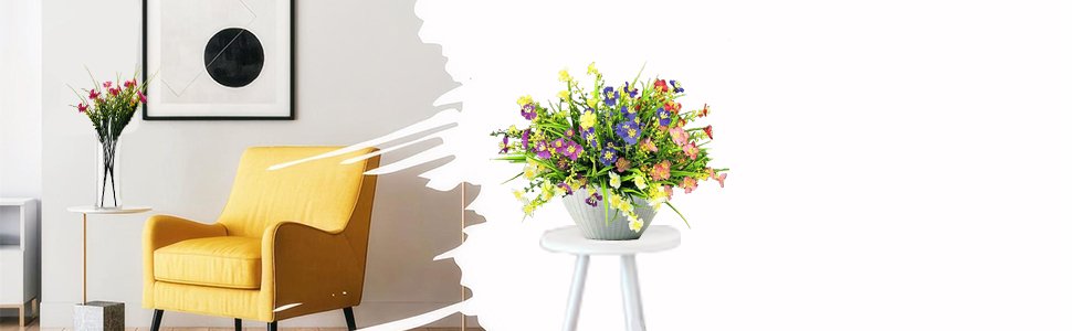 Artificial daisy flower arrangement in a gray pot on a white stool, next to a yellow armchair and a vase of flowers.
