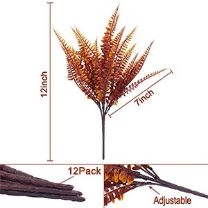 Artificial fall fern bush with dimensions labeled 12 inches tall and 7 inches wide, shown against a white background.