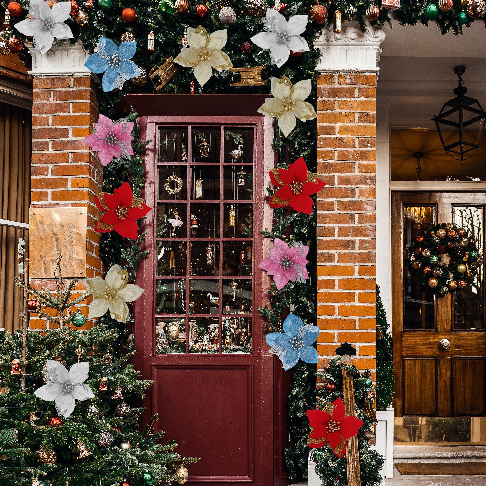 Christmas poinsettia decorations with glitter and clips adorning a doorway and Christmas trees.