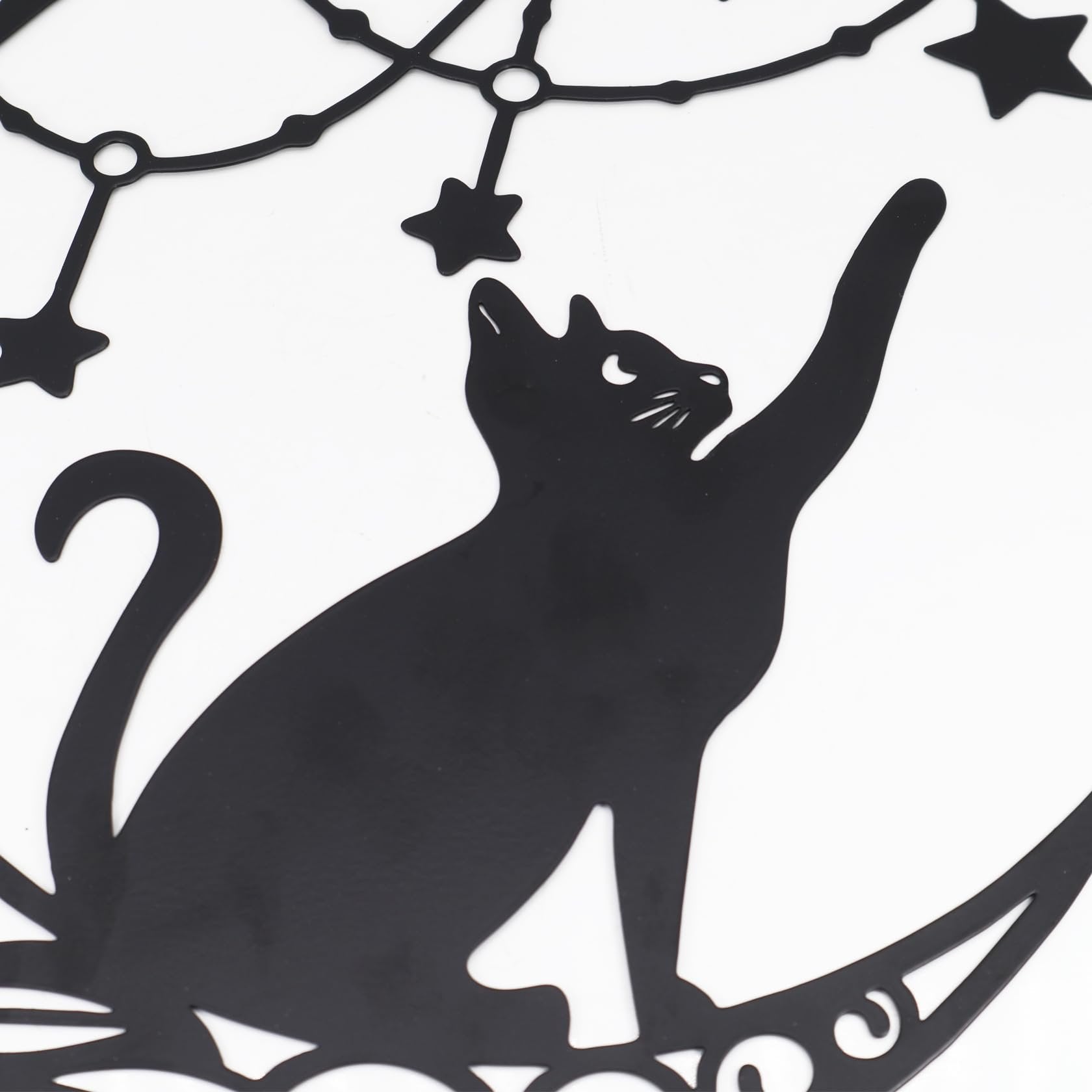 Black metal moon cat wall decor with stars and celestial elements, close-up detail.