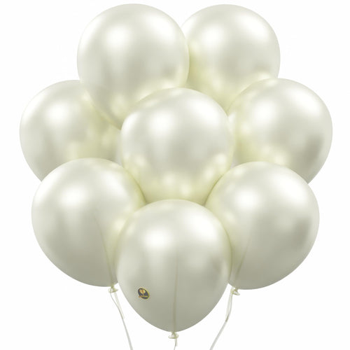 Cluster of pearlized white latex balloons with white strings against a white background.