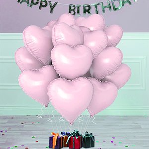Cluster of 12 heart-shaped foil balloons in pink and white, tied to gift boxes on the floor.