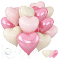 A cluster of heart-shaped foil balloons in bright pink, pastel pink, and pastel white, with a roll of adhesive tape and a straw shown on the left.