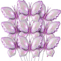 A cluster of 12 purple gradient butterfly foil balloons arranged in a grid formation against a white background.