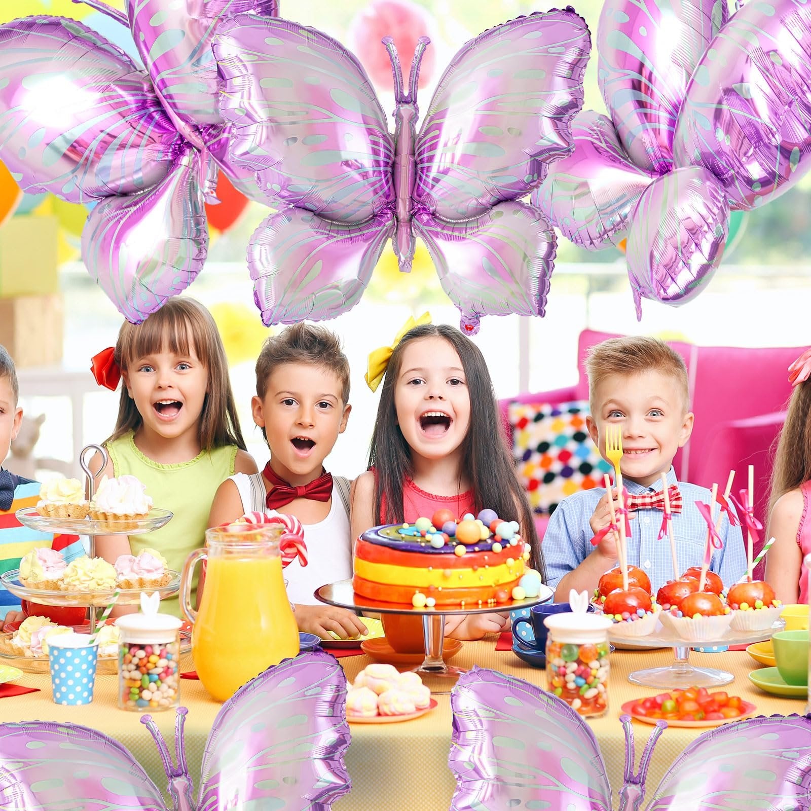 Children at a birthday party with purple gradient butterfly balloons and cake