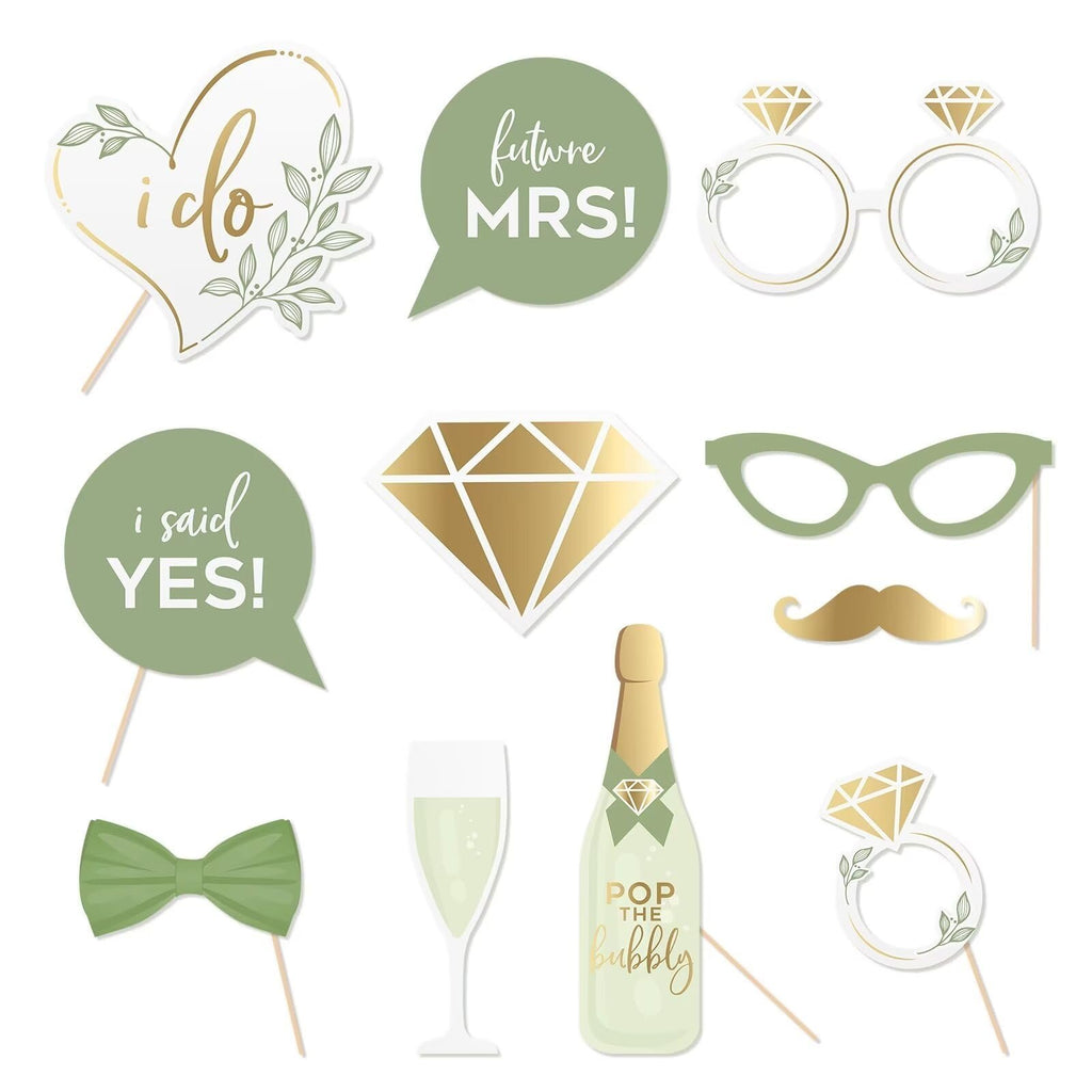Wedding photo booth props including 'i do' heart, 'future MRS!' speech bubble, rings, diamond, glasses, mustache, bow tie, champagne glass, and 'POP THE bubbly' bottle.