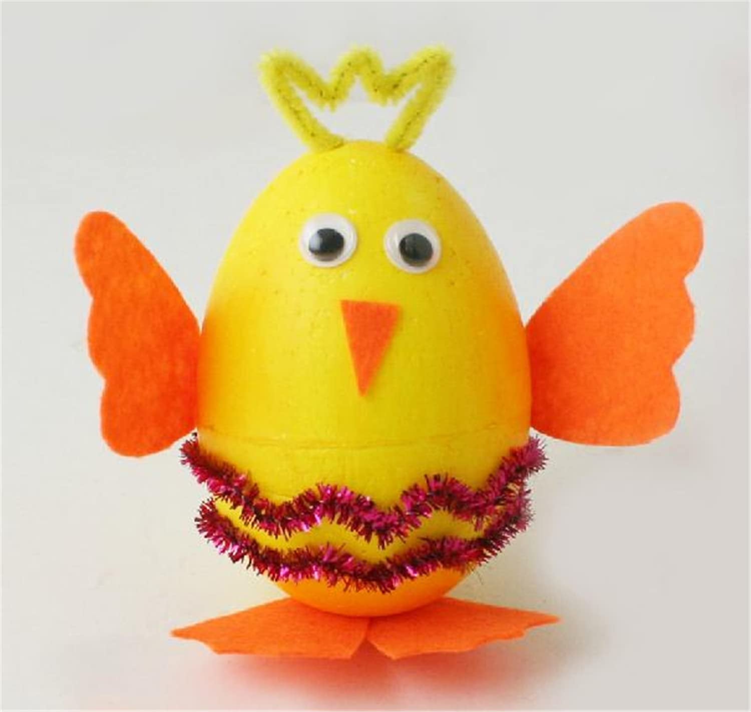 Yellow foam egg craft decorated as a chick with googly eyes and orange felt wings and feet