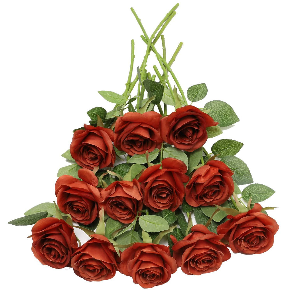 A bouquet of 12 burnt orange artificial silk roses with green leaves and stems, arranged on a white background.