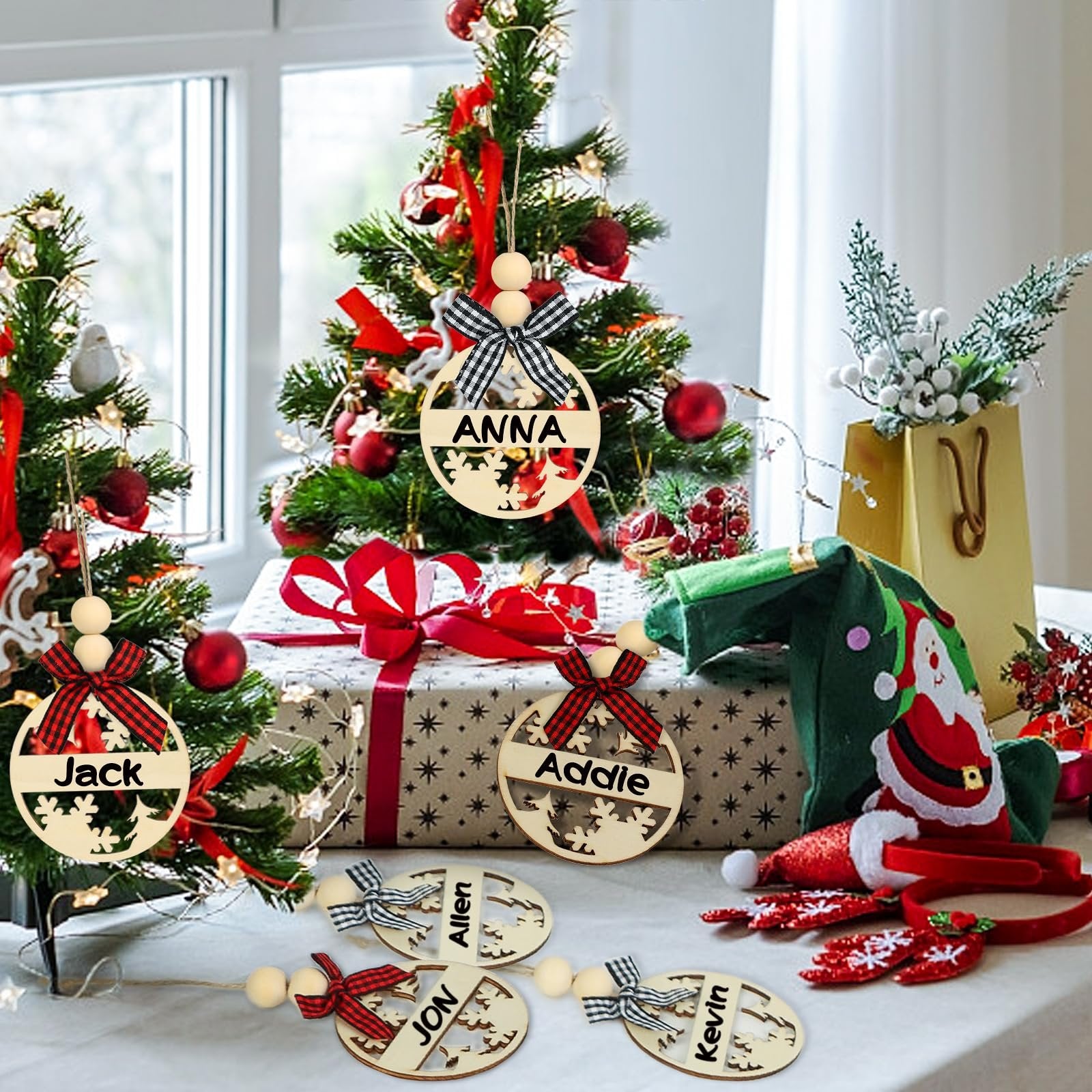Christmas tree with wooden name tags hanging, featuring names like Jack, Anna, Addie, Jon, Allen, and Kevin.