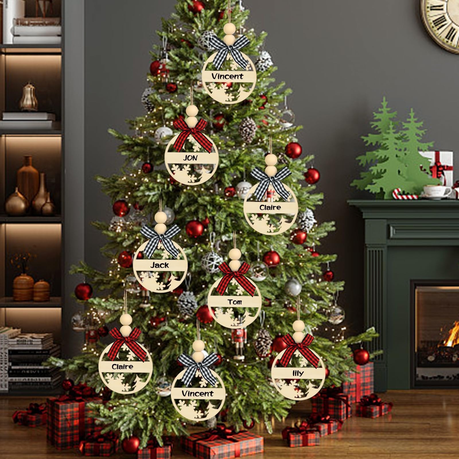 Christmas tree decorated with wooden name tags featuring names like Vincent, Jon, Claire, Jack, Tom, Lily.