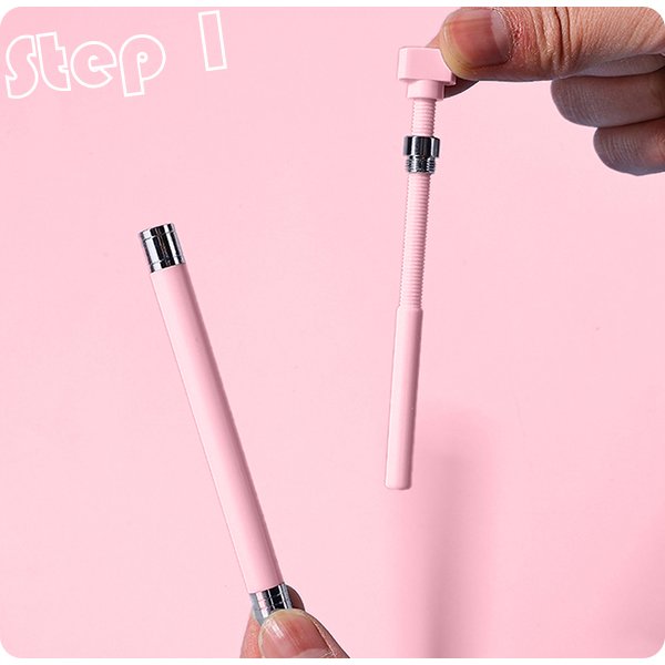 Diamond painting pen parts being assembled, showing a pink pen body and a flexible shaft with a screw top.