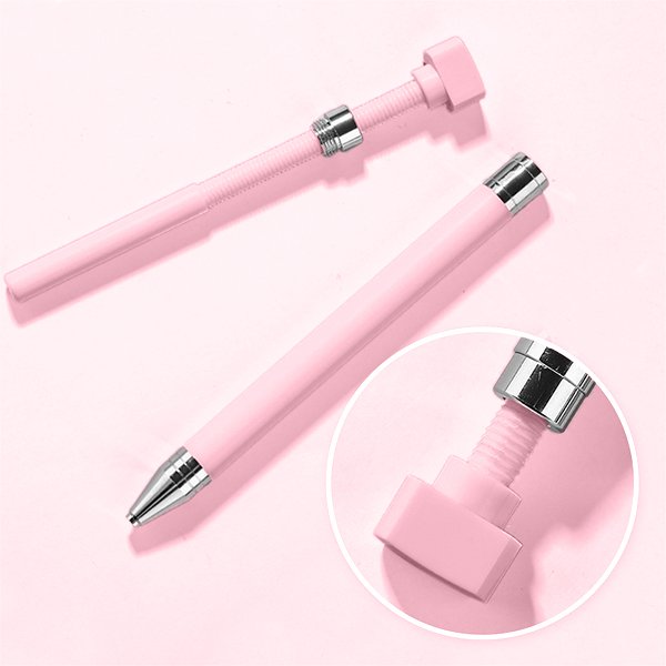 Two pink diamond painting wax refill pens with silver accents on a pink background, one showing the screw mechanism.