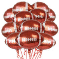 Cluster of 12 football-shaped foil balloons with white laces and stripes, on white background.