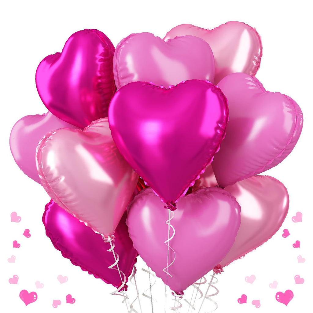 A bouquet of pink and magenta heart-shaped foil balloons with white ribbons against a white background.